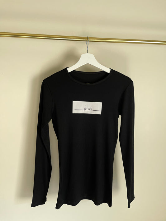 Black longsleeve with arabic qatar print