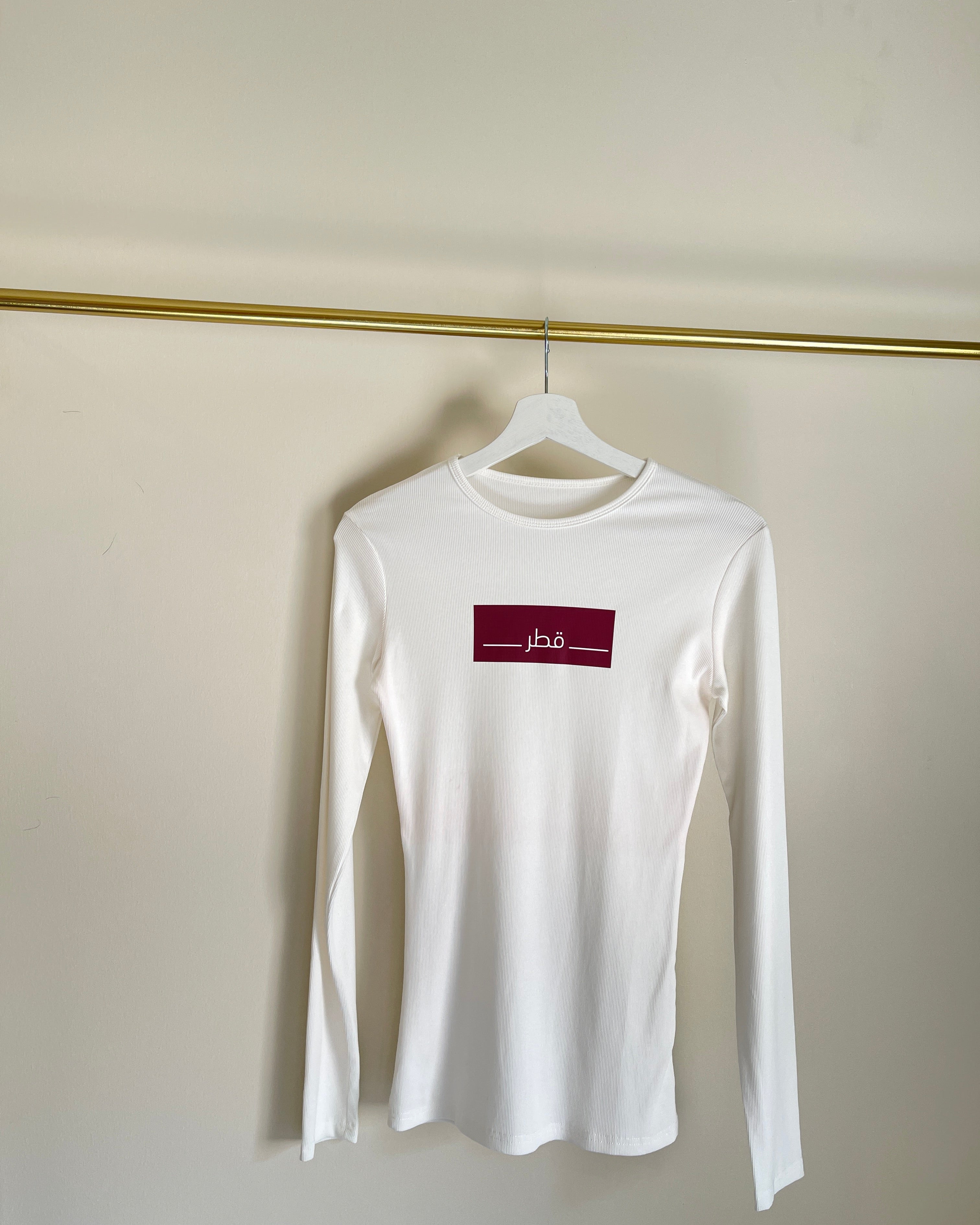 White Longsleeve with arabic qatar print