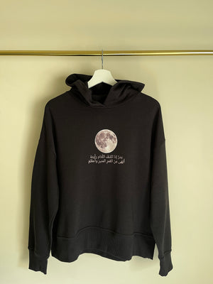 White moon black sweater